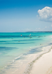 White sandy beach and Indian Ocean of the coast of Zanzibar