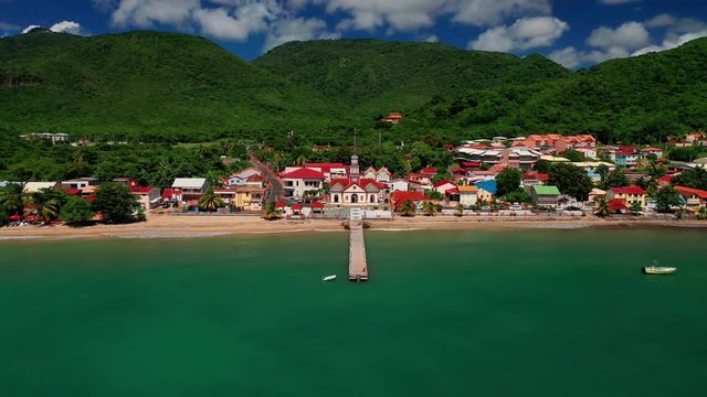 Fly over St. Henry Catholic Church in Les Anses d'Arlet in Martinique