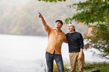 white Caucasian family father and teenager son in Fall forest