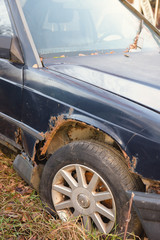 Old broken, rusty car. Car after the accident rusted without repair. Rusty car.