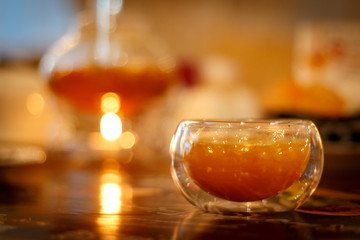 Sea buckthorn tea in a glass cup