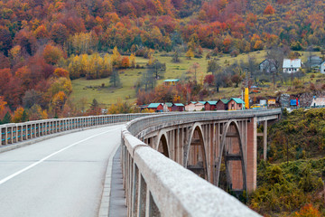 The bend of the Durdevica bridge over the Tara River. Autumn in Montenegro