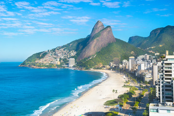 Beautiful aerial view of Ipanema and Leblon  Beach with Two Brothers Mountain (Morro Dois Irmãos) and Favela Vidigal in the background - Rio de Janeiro,Brazil - obrazy, fototapety, plakaty