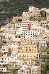 Fototapeta na wymiar architecture in the old beautiful italian coastal town of positano where all the building are built onto going up the cliff face.