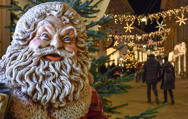 Santa Claus and beautiful Christmas decorations, at night, in the city center of Graz, Styria region, Austria