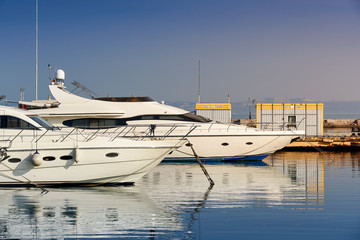 Sea small boats at the pier