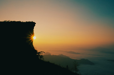 The morning sunrise at Phu Chi Fa, the high mountain landscape in northern Thailand can see the fog in the background.
