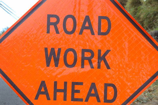 Road work ahead sign in Wailuku, Hawaii due to water main break. 