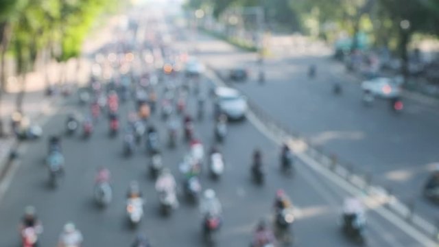 Blurred footage of traffic transport in Ho Chi Minh, Vietnam. Royalty high-quality free stock footage of slow moving traffic with lots of motorbike, car... transport on the road in Ho Chi Minh city