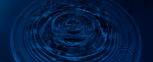 Deep blue drop of water