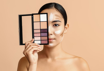 Young Asian woman with cosmetics for contouring makeup on color background