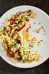 Chinese cabbage salad on white plate