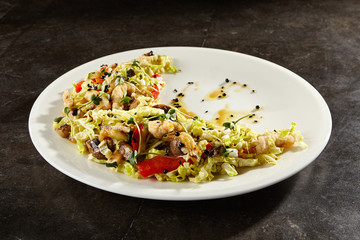 Chinese cabbage salad on white plate