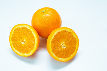 Fresh slice orange tropical fruit on white background