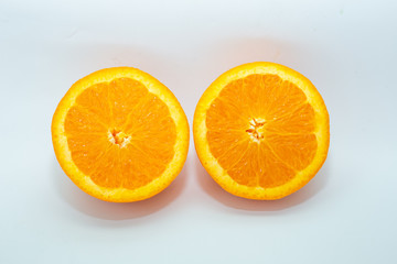 Fresh slice orange tropical fruit on white background