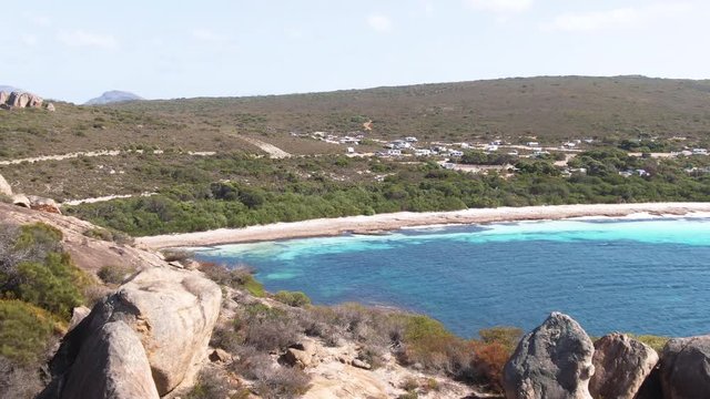 Aerial footage of Lucky bay in Esperance's Cape le Grande national park, camping sites visible on in the background. Australia.