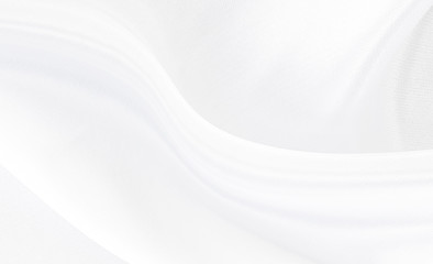 White gray satin texture that is white silver fabric silk background with beautiful soft blur pattern natural.