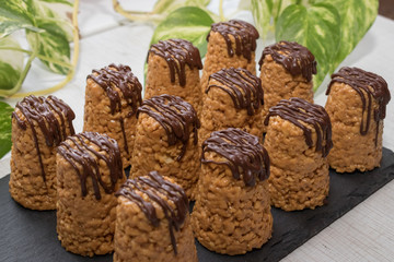 Homemade anthill cake covered with chocolate