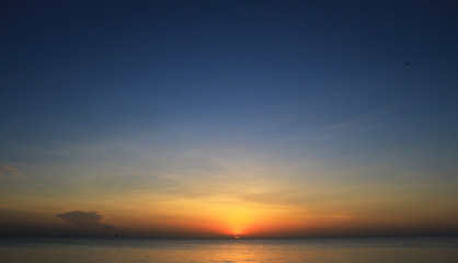 Naklejka na ściany i meble beautiful sunrise on the sea