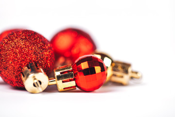 Christmas balls big and small red om white background, New year. - Powered by Adobe