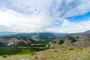 landscape with mountains and clouds