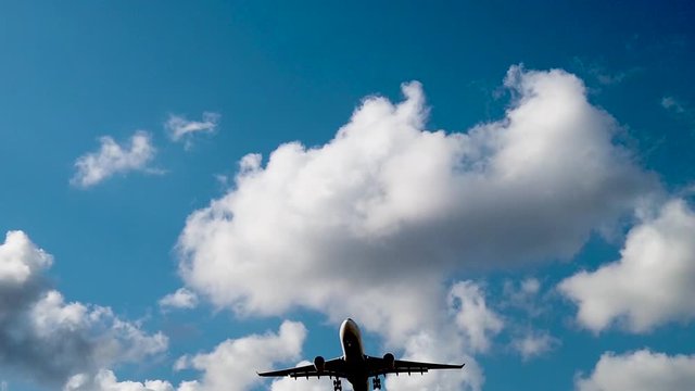Aircraft landing in slow-motion - passing through before runway