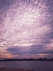 sunset over city lake