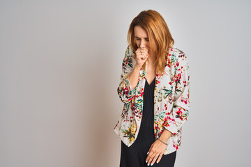 Young caucasian business woman wearing spring floral jacket suit over isolated background feeling unwell and coughing as symptom for cold or bronchitis. Healthcare concept.