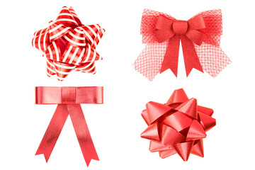 collection of red ribbon bows isolated on white background.