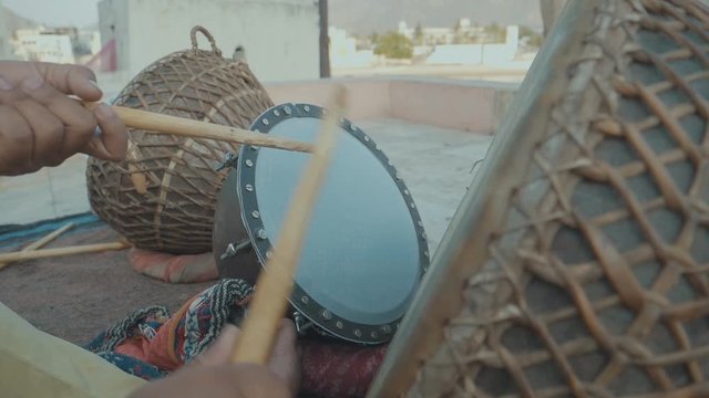 Close Up Slow Motion Hands Playing Traditional Indian Drums On The Street