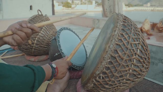 Close Up Slow Motion Hands Playing Traditional Indian Drums On The Street