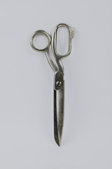 metal tailors scissors on a white background