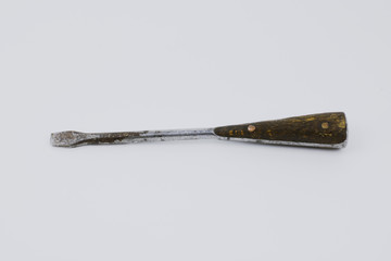 old screwdriver with wooden handle