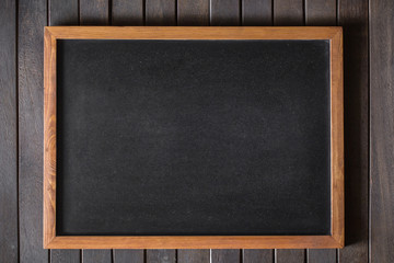 Abstract wood frame Chalk rubbed out on blackboard or chalkboard texture. clean school board for background or copy space for add text message. Backdrop of Education concepts.