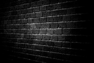 Old brick wall with vignetting of dark or black blur border gradient in bw or black and white tone...