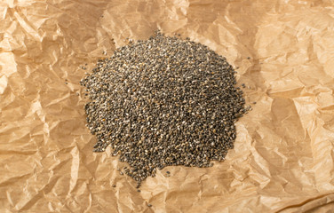 Pile of Chia Seeds in Wrapping Parchment Paper