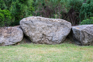 Big rock or stone in the garden.