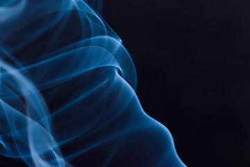 Colourful smoke fumes in different patterns on a black isolated background. Print for t-shirt.