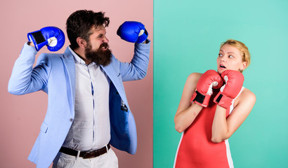 real champion. bearded man hipster fighting with woman. family couple boxing gloves. Strength and...