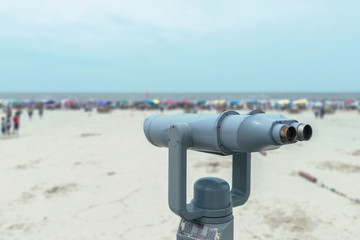 Binoculars by the beach -- summer scenery of silver beach in beihai, guangxi, China.