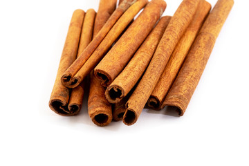 Top view cinnamon sticks isolated on white background.
