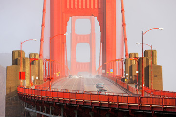 Fototapeta na wymiar The close up shot in Golden Gate Bridge in rainy day with wet road.