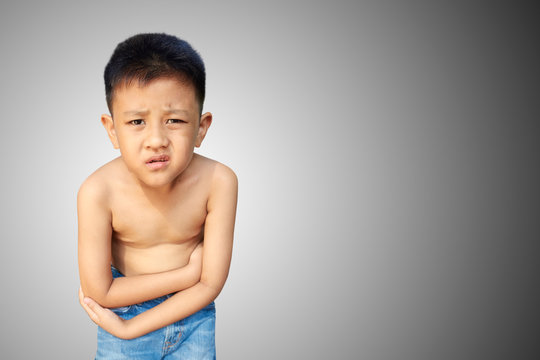 Asian Kid Stomach Ache, Isolate On White Background.