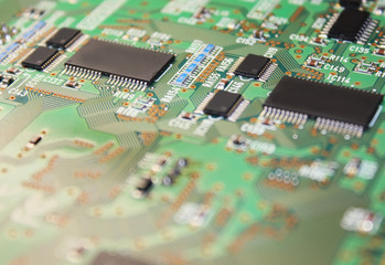 Closeup of electronic circuit board or PCB printed circuit board