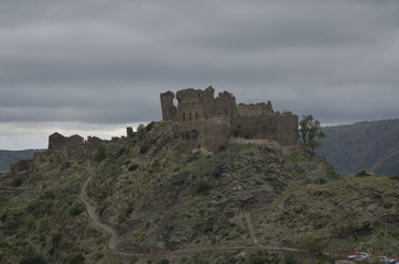 Fototapeta na wymiar old abandoned castle trekking in the edge of Amendolea Bova national park Aspromonte