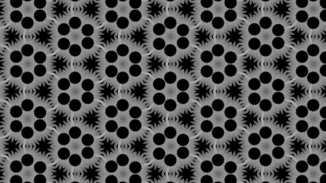 Graphic motif in black and white composed of chained circles with stroboscopic and hypnotic effect, which rotates clockwise and increases in size