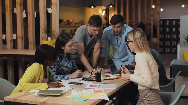 Multi-ethnic business people meeting brainstorming sharing new ideas. Success business, start-up, teamwork concept.