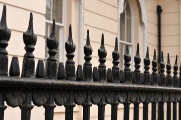 wrought iron fence at victorian building in London