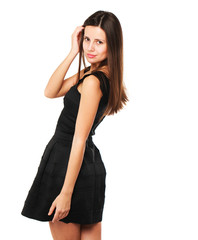 Fototapeta premium Beautiful brunette woman in black dress