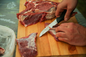 raw beef meat on a cutting board